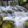 Rushing water moss rocks